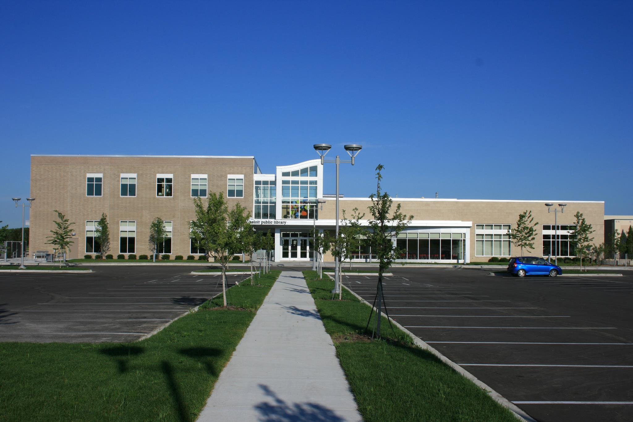 Front of Beloit Public Library building from across the parking lot