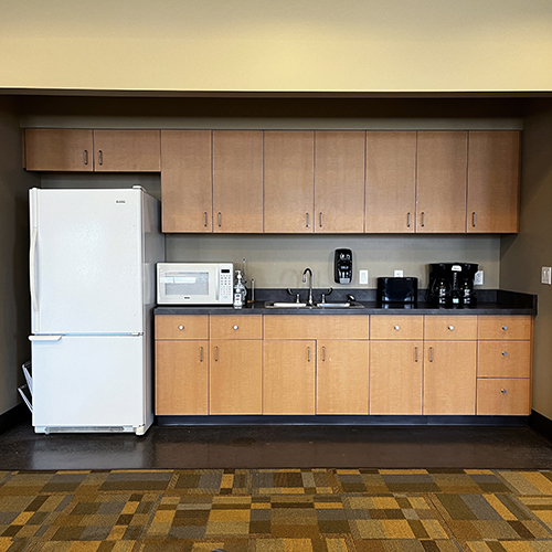 Cabinets with refrigerator and sink