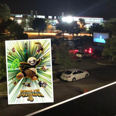 Movie poster over a photo of a movie playing in a parking lot at night