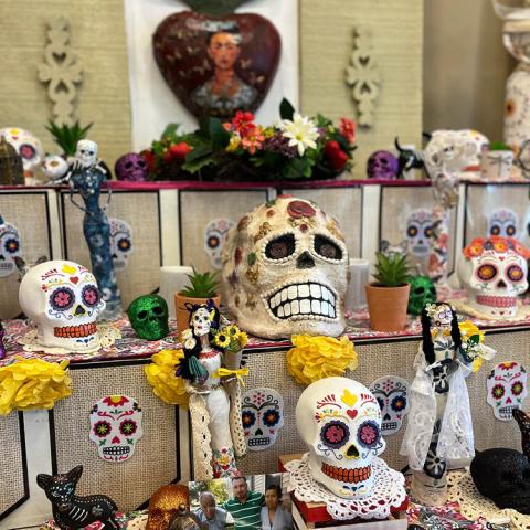 Traditional oferenda display with skulls on an altar