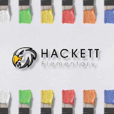 School logo with colorful paintbrush border