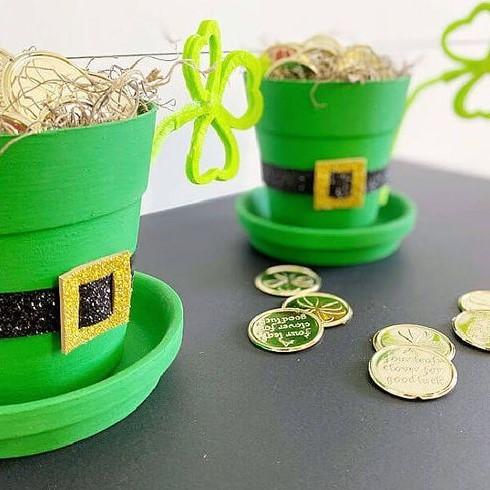 Flowerpots decorated as leprecauns